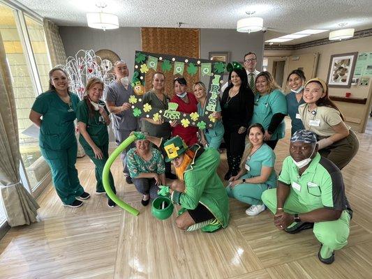 Staff enjoying St Patrick's day with our residents .