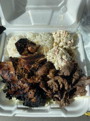 Finau favorite with white rice, teriyaki steak, teriyaki chicken, macaroni salad and cabbage under the meat.