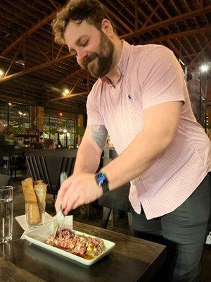 Zack mixing our beef tartare