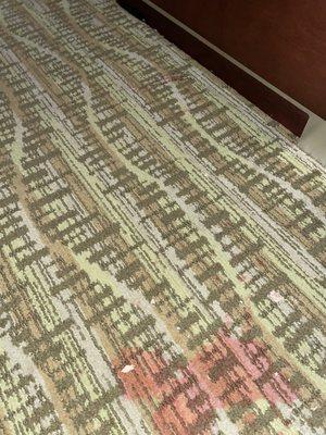 Stain on outdated carpet