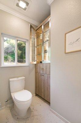 A new custom built-in in the watercloset that matches the vanity