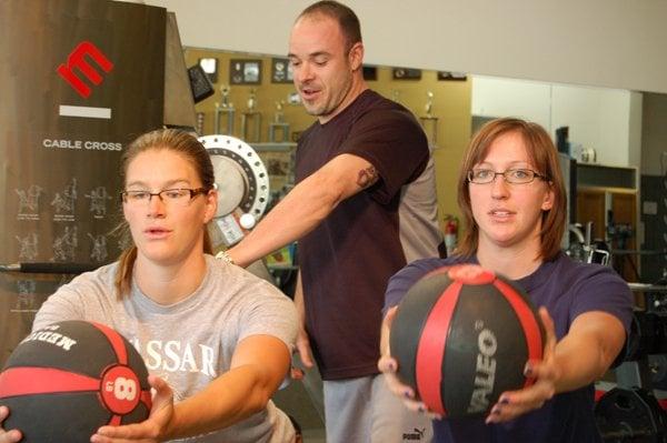 Rich Training two volleyball stars in Mid and Low Back Stability under Load.  Fun Stuff