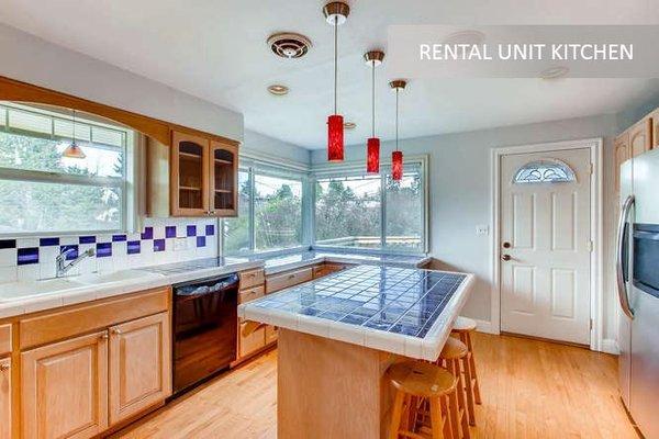 This West Seattle kitchen is a good example of our building to the taste of the owner, adding natural light with great local views.