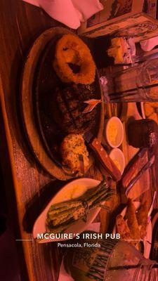 Molly cut steak with asparagus.