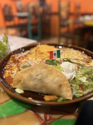 Combo plate taco, sopito, and flauta.