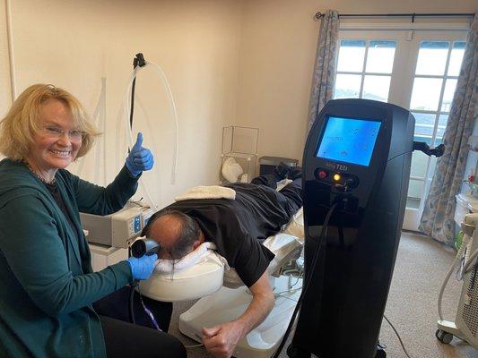 Ted hair restoration taking place on male pattern baldness.