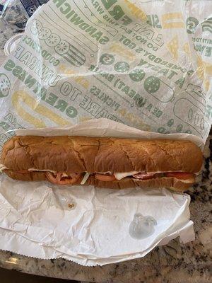 Roasted Turkey Footlong on Italian bread w/ provolone, lettuce, tomato, black olive and mayo