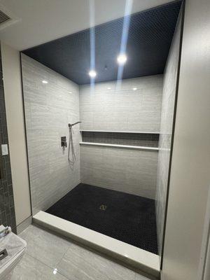 New two people shower with rain head and custom shelving