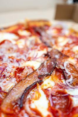 Double Pepperoni Pizza w/ extra Mozz, Red Onions, Bacon & Truffle Oil ($22 + add-ons [you don't want to know])