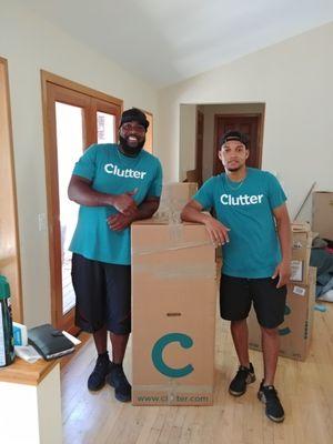 Marlon and Jordan showing off the Clutter packaging.