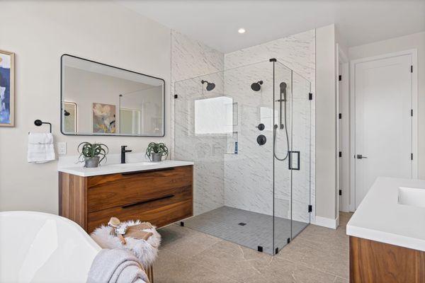 Organic modern bathroom design, showcasing our Parker bathroom vanity collection in Natural Walnut.