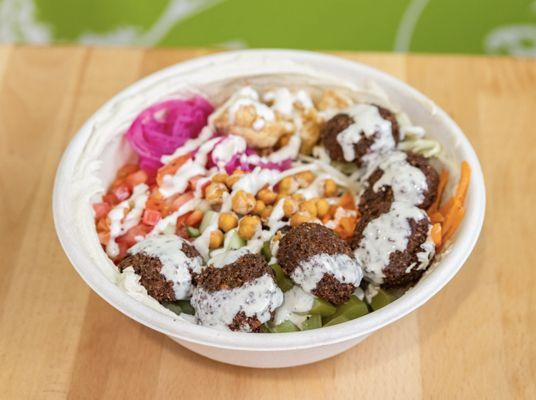 Six piece falafel over rice bowl