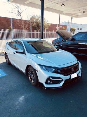 Civic Hatchback with newly-installed glossy black front lip