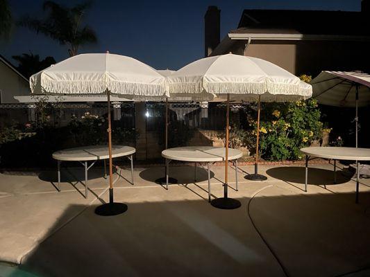 Tassel umbrellas and round tables