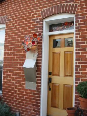 1442 battery ave mailbox sconce and stained glass transom