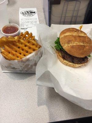 Single burger with everything but tomatoes and a small order of waffle fries. They take "small" to the extreme.