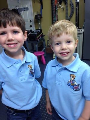 My little future employees wearing the embroidered shirts Susan Kay's serviced.