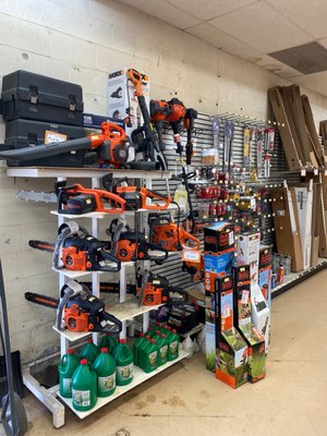 Chainsaws, chainsaw bars and chains, oil, fuel additives, spark plugs, string trimmers, hedge trimmers