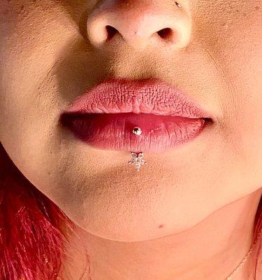 Vertical lip piercing by Ayan