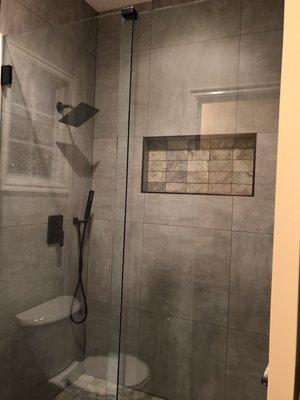 New no top railings and roller only bottom 1/2 glass- great modern looking shower.