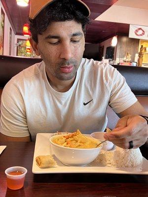 Hubby enjoying his L13. Yellow Curry Lunch Special