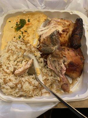 1/2 Chicken with 2 sides (rice and spicy hummus - so good)