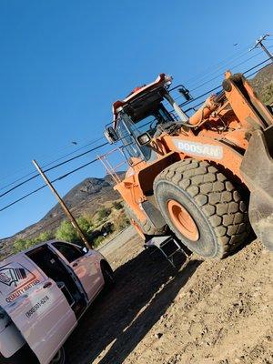 Heavy equipment windshield replacement