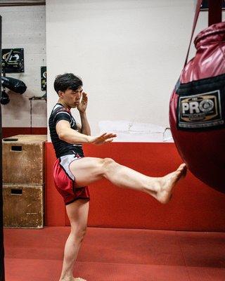 Coach Joe Kim training Muay Thai Teap kick