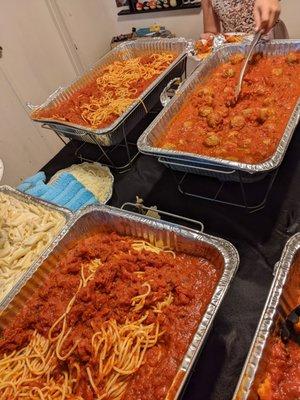 Spaghetti with marinara sauce and meatballs in marinara sauce