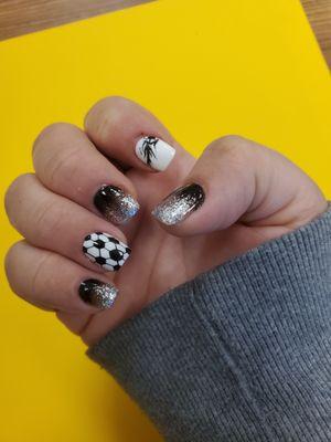 Soccer ball accent nail, flaming soccer ball accent nail, and black & silver glitter ombre