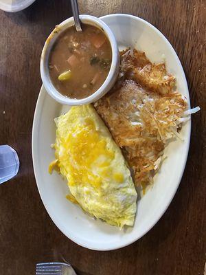 Egg, sausage, cheese omlet and cheese omelet. Charro beans and hash browns.