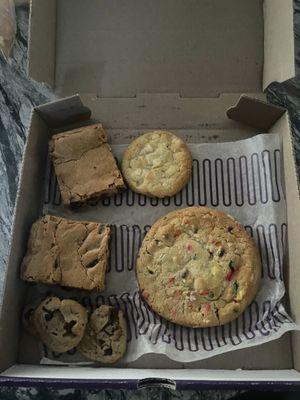 Here's a photo of the 4 x 4 meaning 8 cookies  box that I paid $30 for on my first and clearly last time visiting insomnia cookies today