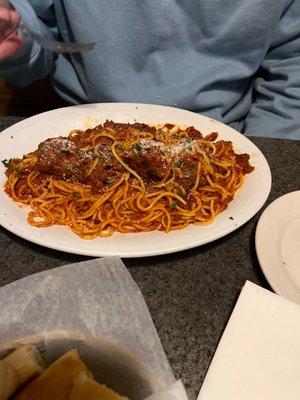 Spaghetti with meat, balls, and meat sauce, and Parmesan cheese