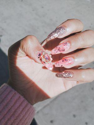 Gel-X(tension), pink marble design with foil, glitter, and pearls + jewel!