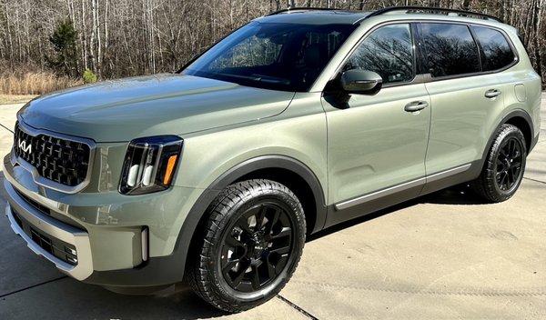 Our new ride is a beautiful Jungle Green. 2023 Kia Telluride.