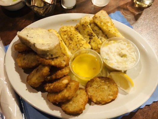 Broiled haddock, potato pancakes, Cole slaw & bread.