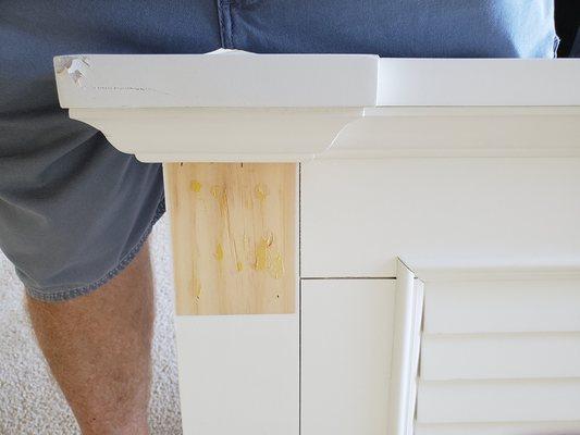 Footboard of BRAND NEW guest bedroom set missing a piece.