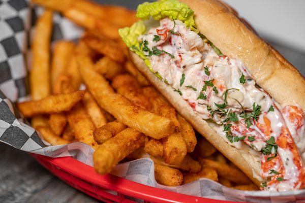 Lobster roll with cajun fries