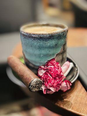 Coffee and carnation flower