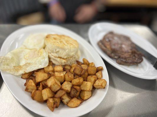 Steak and egg plate with home fries