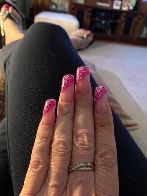 These are my nails that were done by Kim. She's very talented and creative. I highly recommend this nail salon