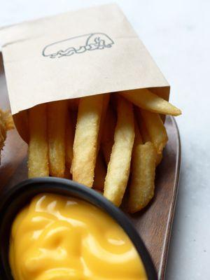 Dipping fries in hot cheese cures the winter blues!