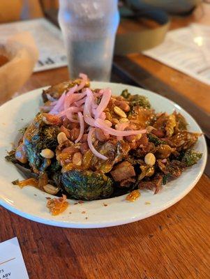 BRUSSELS SPROUTS
 -
 Flash fried with pork belly, sweet Thai peanut sauce, roasted peanuts, pickled red onions - March 2023