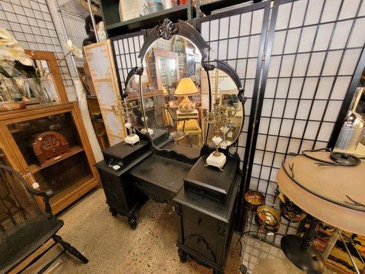 Black vanity with candelabras