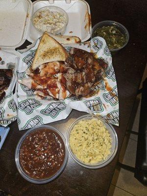 Q Man's (turkey n brisket) Baked beans, smoked machine n cheese, collards, turkey bacon potato salad.