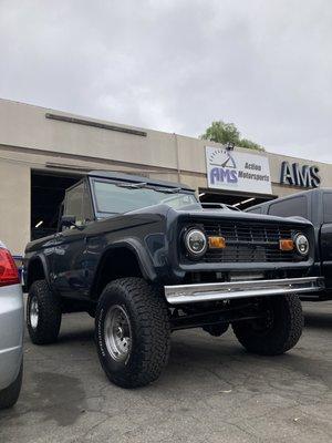 Ford Bronco in the shop for new body bushings to be installed.