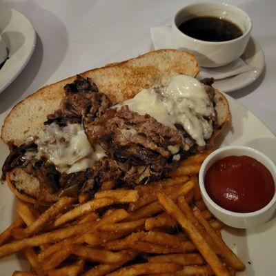 Shaved prime rib sandwich with jus. Fries were extremely salty