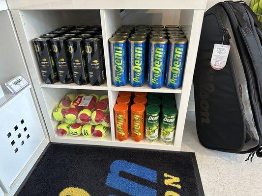 Remember to grab a can of tennis balls before hitting the courts!