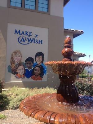 Main entrance, Kaiser water fountain and mural