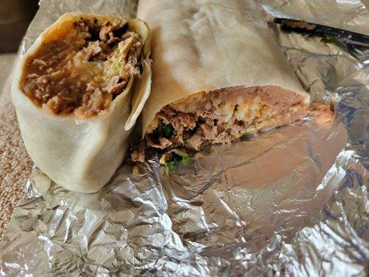 Super Steak Burrito,  w/ refried beans and green sauce